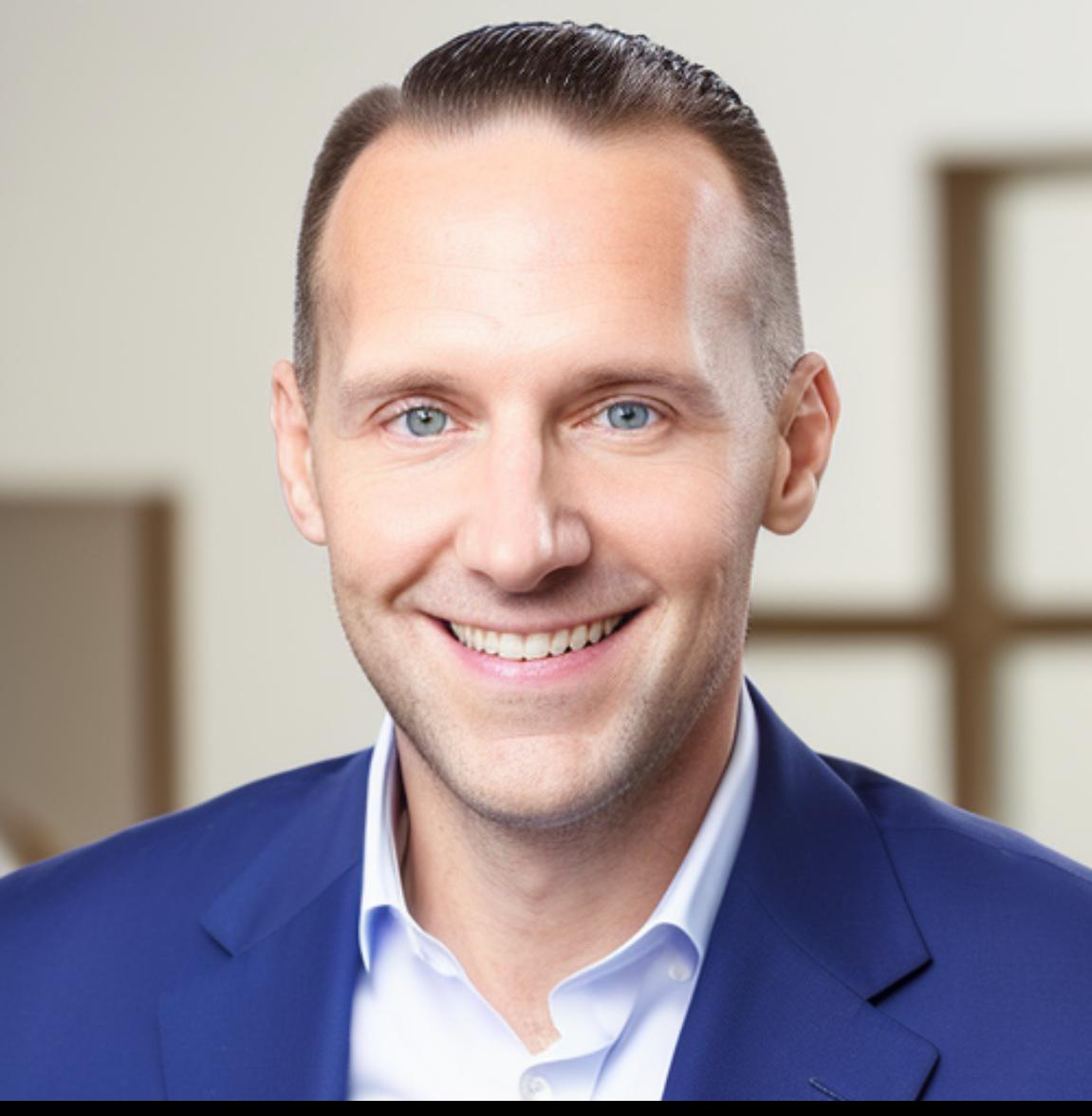 Man in suit smiling at camera