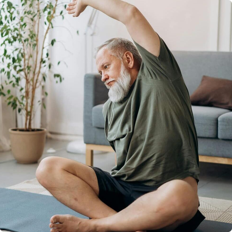 Senior man yoga stretch