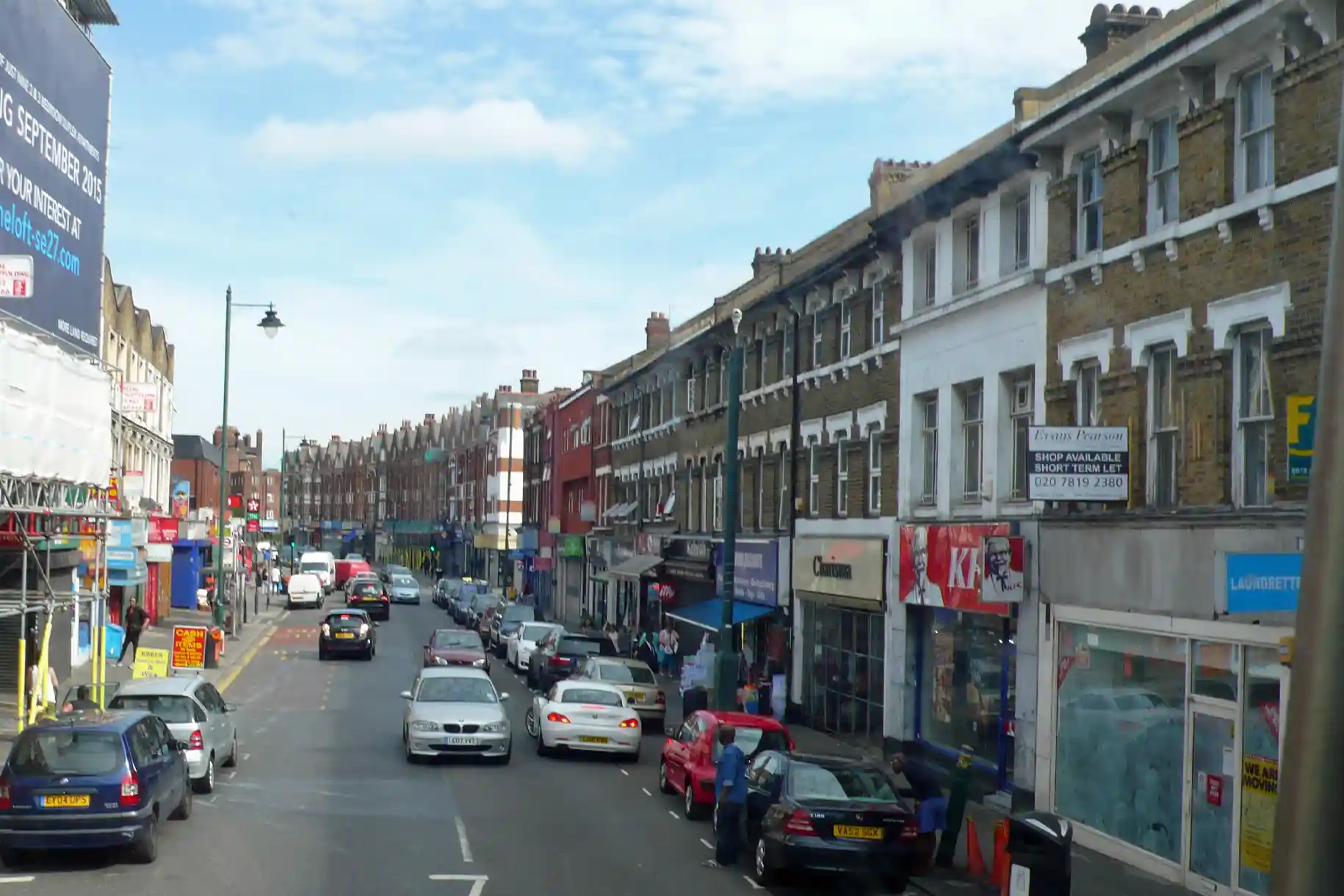 Urban storefronts with cars